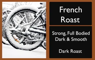 rocky-mountain-roastery-french-roast-dark-coffee-label-unsung-roasters French Roast coffee label with snow-covered bicycle, symbolizing strong and smoky dark roast flavor.