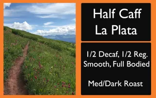 rocky-mountain-roastery-half-caff-la-plata-smooth-balanced-coffee-label-unsung-roasters Half Caff La Plata coffee label with mountain trail and wildflowers under blue sky.
