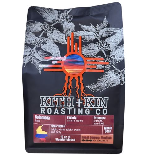 Kith + Kin Colombia coffee bag with red label featuring flavor notes and origin map.