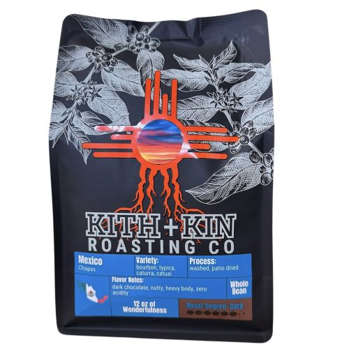 Kith + Kin Mexico Chiapas dark roast coffee bag with blue label highlighting tasting notes and origin.