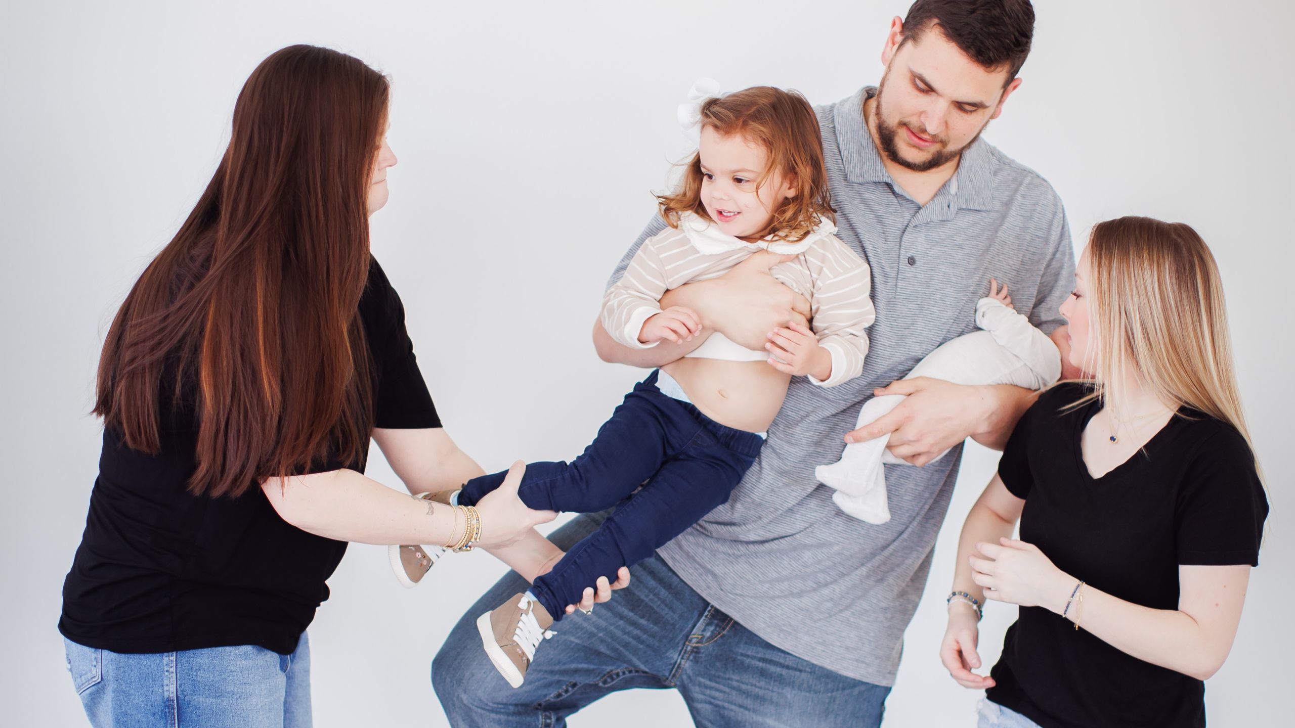 The Carmans family - Michael, Shelby, Hailey, Harper, and Darcy, founders of Unsung Roasters standing together